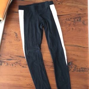 Aerie leggings. Black and pink on the sides.